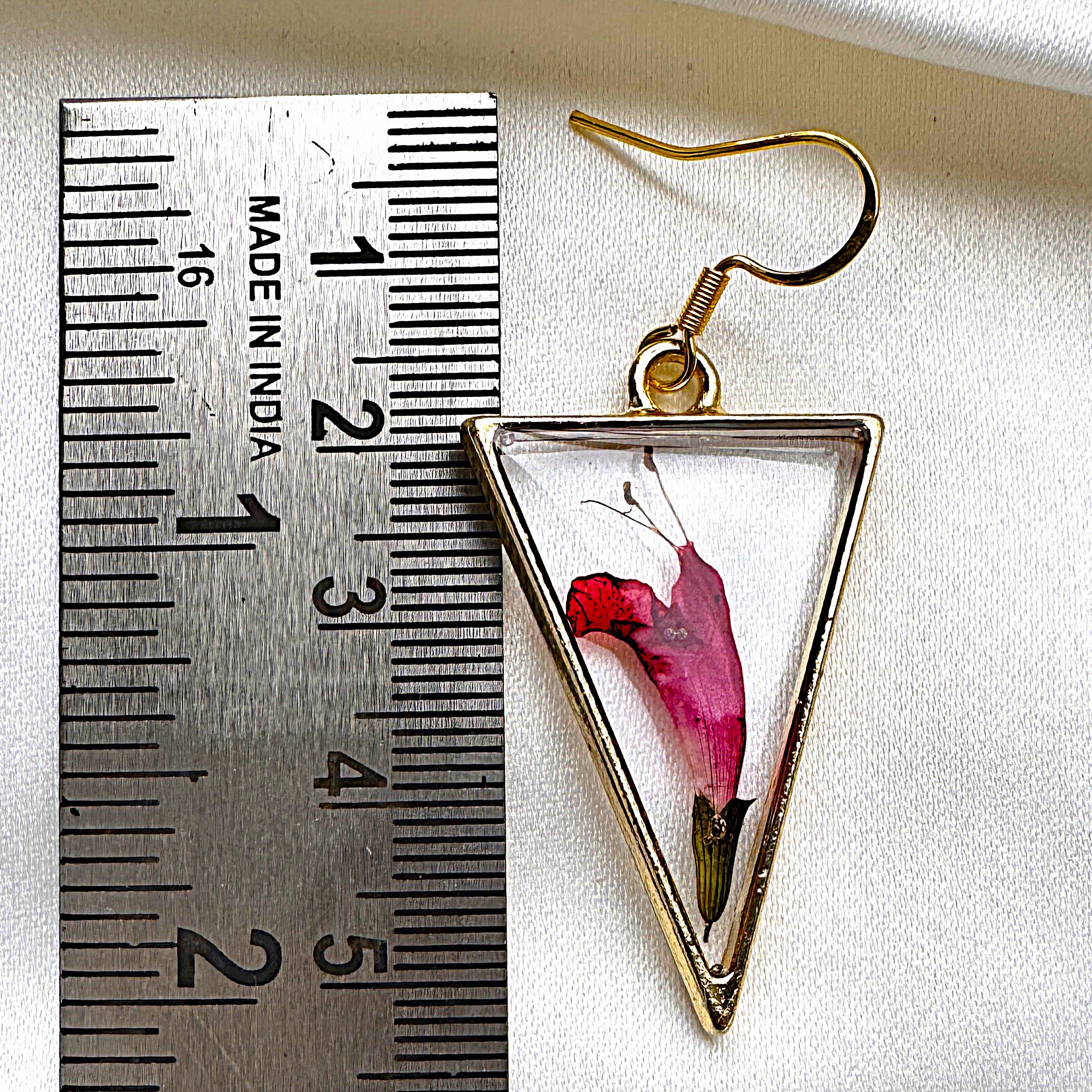 thumbe-drop ear rings